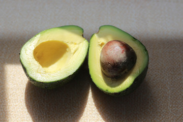 two avocado halves closeup