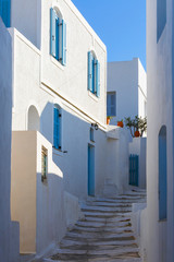 Street with typical Cycladic architecture in Artemonas village on Sifnos island in Greece.