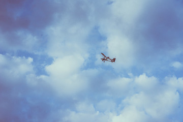 Fototapeta na wymiar Plane in the clouds