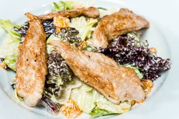 salad with chicken meat cream sauce on a white background