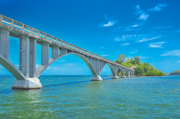 	the pedestrian bridge in the Saman Gulf Dominican Republic, connects the coast with two tiny islets of Cayo Linares and Cayo-Vihia