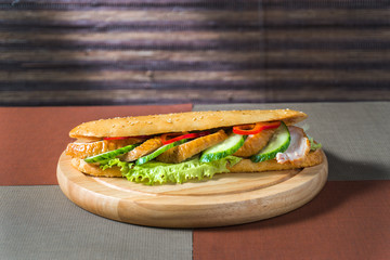 sandwich with chicken and fresh vegetables