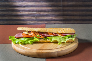 sandwich with ham and fresh vegetables
