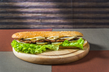 sandwich with chop and fresh vegetables