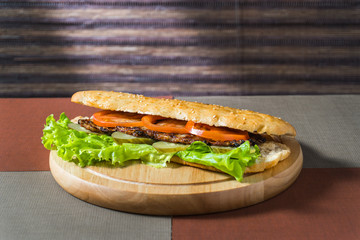 sandwich with chop and fresh vegetables