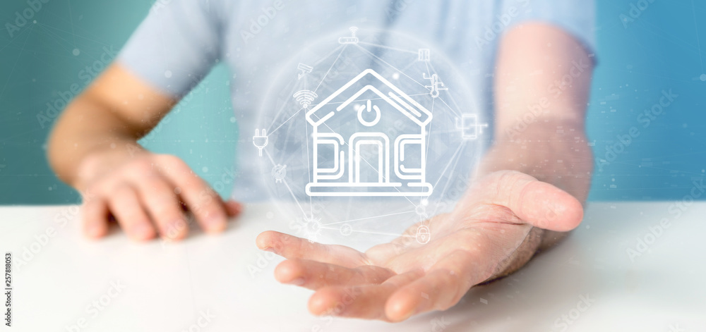 Aufkleber businessman holding smart home interface with icon, stats and data 3d rendering