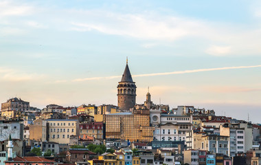 Fototapeta na wymiar Cityscape Beyoglu district old houses with Galata tower on top in Istanbul, Turkey.