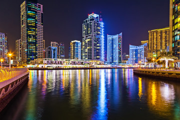 Fototapeta na wymiar Dubai Marina bay holiday night scene skyscraper UAE.
