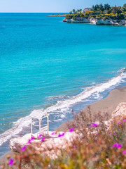 Fototapeta premium Beautiful summer view over white cliffs and turquoise blue water sea at Governor's Beach near Limassol, Cyprus.