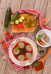 Meatballs with tomato sauce.