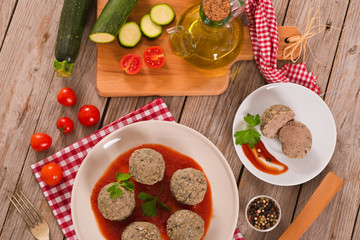Meatballs with tomato sauce.