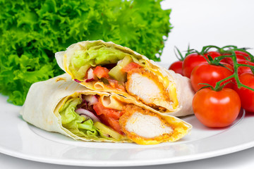 Chicken Shaverma or Doner Kebab with Vegetables on a White Plate Close Up.