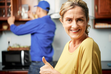 Woman satisfied home services
