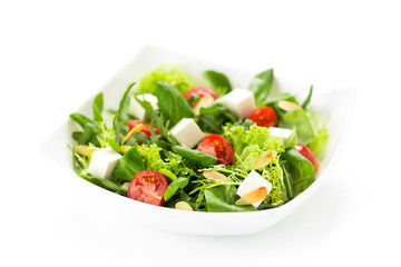 Obraz na płótnie Canvas Fresh vegetable salad on a plate