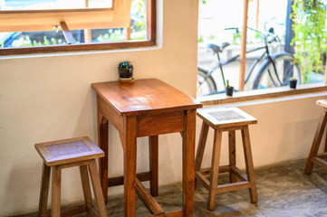 Wooden table and chairs in coffee shop