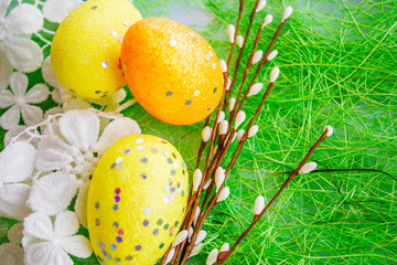 colorful easter eggs on green background