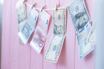 Money Laundering. Money Laundering US dollars hung out to dry. 100 dollar bills hanging on clotheslines