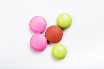 set of multi-colored tablets  on a white background