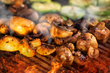 Cooking mushrooms on the grill in the restaurant