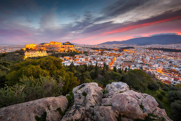 View of Acropolis from Filopappou hill at sunrise, Greece. 