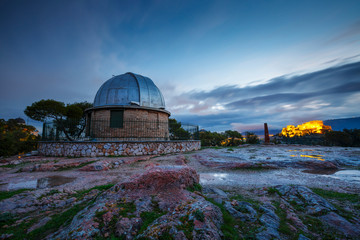Early morning view of the National Observatory and Acropolis from Pnyx in Athens. 