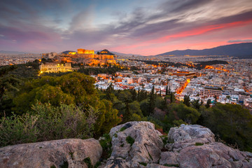 Obraz premium View of Acropolis from Filopappou hill at sunrise, Greece. 