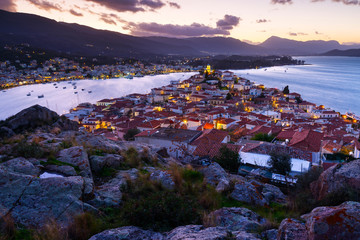 View of Poros island and mountains of Peloponnese peninsula in Greece. 