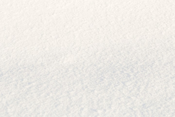 Naklejka premium Winter, the surface of fresh fluffy snow, close-up, glare