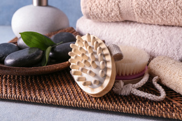 Massage brushes with spa stones on tray