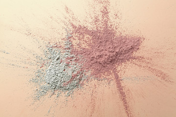Cosmetic clays on color background