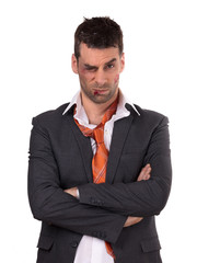 Close up of a businessman with bloody lip, beaten and bruised