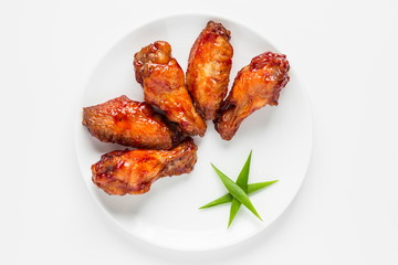 Fried chicken wings appertizer top view isolated on white background
