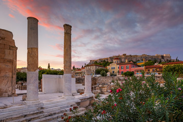 Fototapeta premium Remains of Hadrian's Library and Acropolis in the old town of Athens, Greece. 