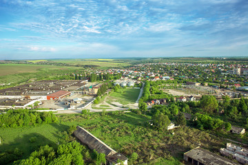 Fototapeta na wymiar Aerial view of compound plant, fields and farms, rural landscape