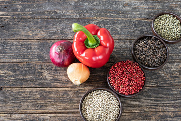 red peppers in a bowl and vegetables 