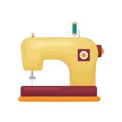 Retro designed model of sewing machine in yellow color isolated on white background