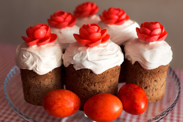 Easter cake with decorative sweet red flowers