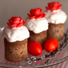 Easter cake with decorative sweet red flowers