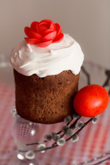 Easter cake with decorative sweet red flowers
