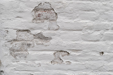 Old destroyed plaster on a wall