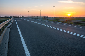 road on the viaduct above the highway