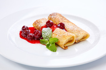 sweet pancakes with cherries