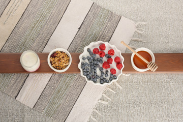 Series about granola, berry and greek yogurt suitable for a healthy breakfast, snack or dessert.