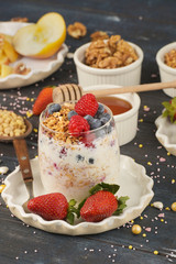 Series about granola, berry and greek yogurt suitable for a healthy breakfast, snack or dessert.