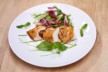 chicken breast with salad