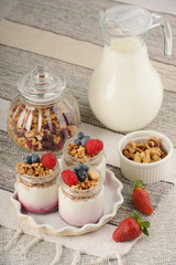 Series about granola, berry and greek yogurt suitable for a healthy breakfast, snack or dessert.