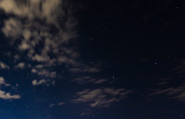 night sky with clouds and stars
