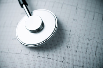 Electrocardiogram and stethoscope