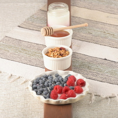 Series about granola, berry and greek yogurt suitable for a healthy breakfast, snack or dessert.