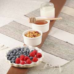 Series about granola, berry and greek yogurt suitable for a healthy breakfast, snack or dessert.